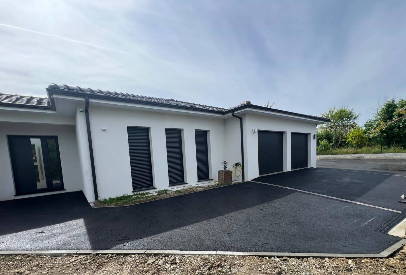 Installation stabilisateur de gravier pour voiture Saint-Loubès
