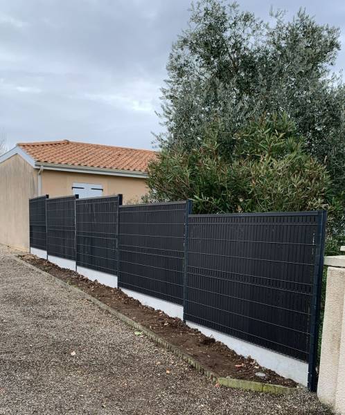 Installation clôture mitoyenne avec occultants 33240 